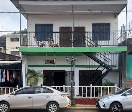 Hostel Rossy's exterior view showcasing its proximity to San Juan del Sur Beach in Nicaragua