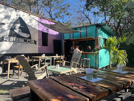 Open-air seating at The Maderas Café with freshly brewed coffee and brunch dishes near Playa Maderas, Nicaragua