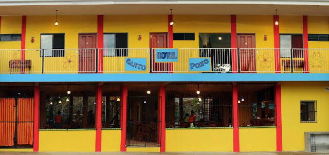 Garden view of Hotel Santo Pozo with outdoor pool in San Juan del Sur