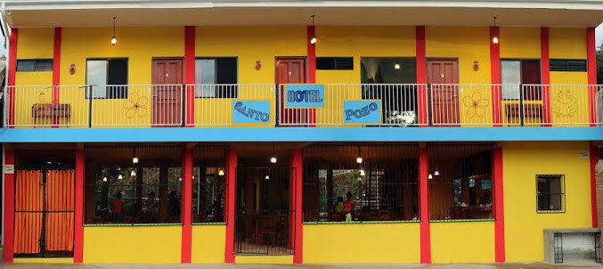 Garden view of Hotel Santo Pozo with outdoor pool in San Juan del Sur