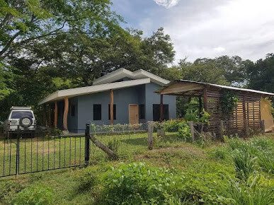 Exterior view of Forest House surrounded by lush greenery near San Juan del Sur