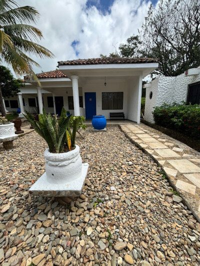 Hotel Remanso Beach Villas' exterior with garden view and eco-friendly design in San Juan del Sur, Nicaragua