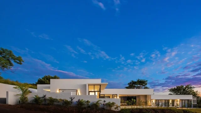Exterior view of Casa Chill with infinity pool overlooking Nacascolo Bay in San Juan del Sur