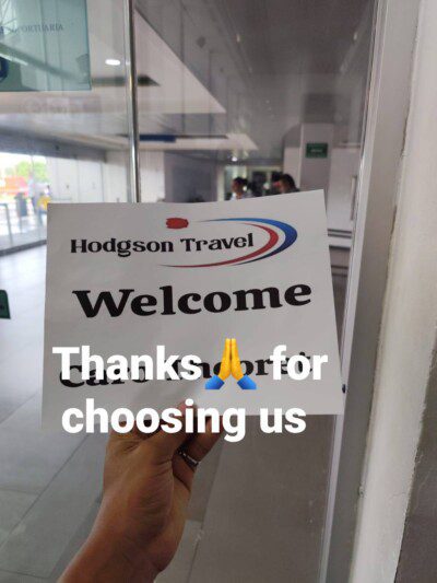 Hodgson Travel Transport shuttle van arriving at Managua Airport