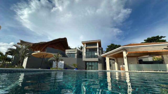 View of Orquidea Del Sur – Luxury Boutique Resort across infinity pool