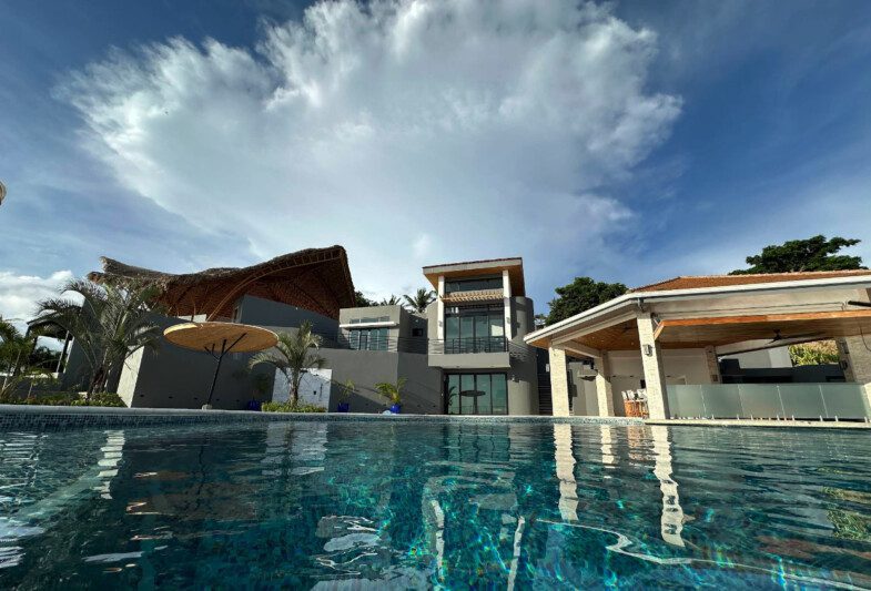 View of Orquidea Del Sur – Luxury Boutique Resort across infinity pool