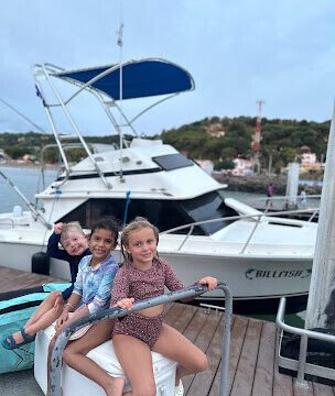 28-foot Bertram sportfishing boat cruising off San Juan del Sur