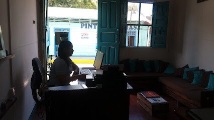 Office entrance of Nica Dream Consulting on Avenida El Tropezón, San Juan del Sur, with company signage