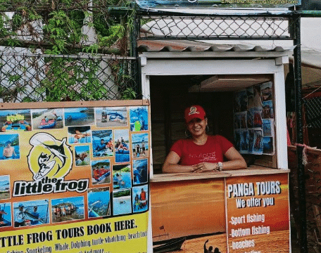 Little Frog Tours image of stall with worker in red