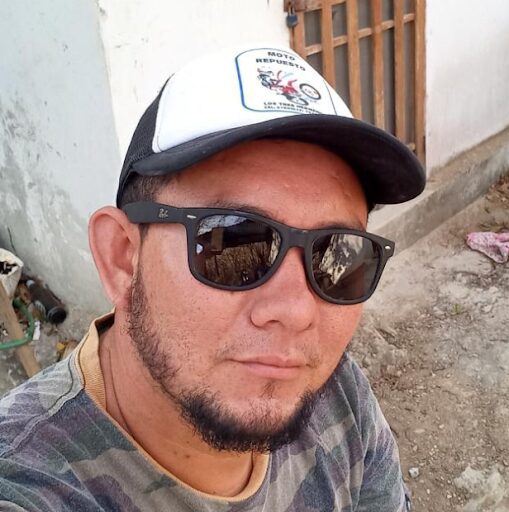 Junior Handyman building or repairing a fence or bodega in San Juan del Sur