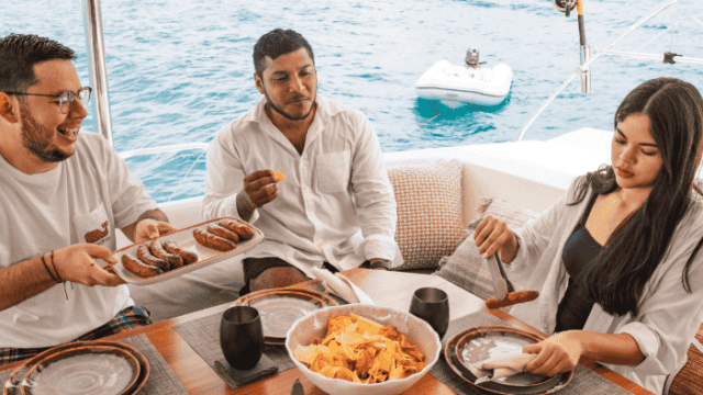 People dining aboard the Santana Sail Nicaragua Yacht
